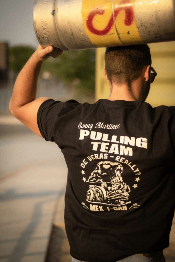a black tshirt made for a pulling team