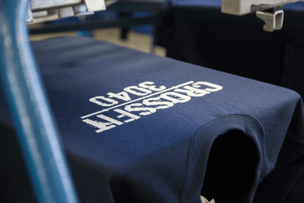 navy tshirt with crossfit printed onto it
