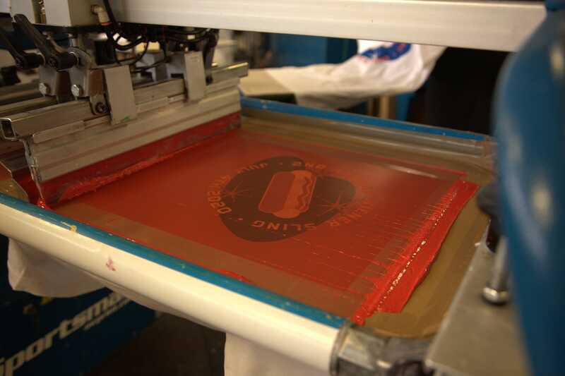 brewery company logo on a screen printer for tshirts